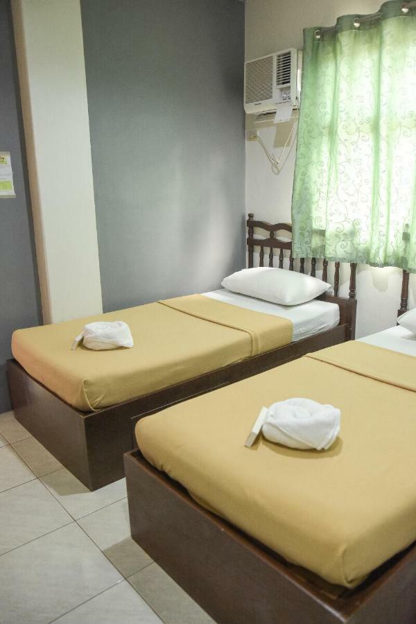 Tiptop Tower Suite Inn Ντουμαγκέτ Δωμάτιο φωτογραφία